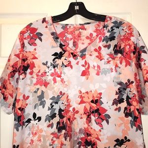 Short sleeve orange flowered scrub top